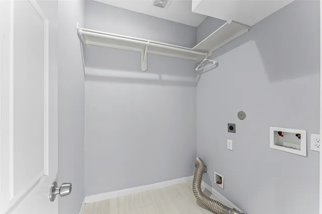 a bathroom with a shower and a bath tub