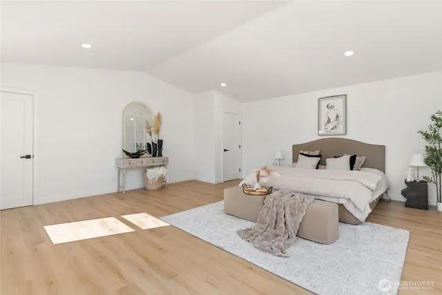 a bathroom with a shower and a sink