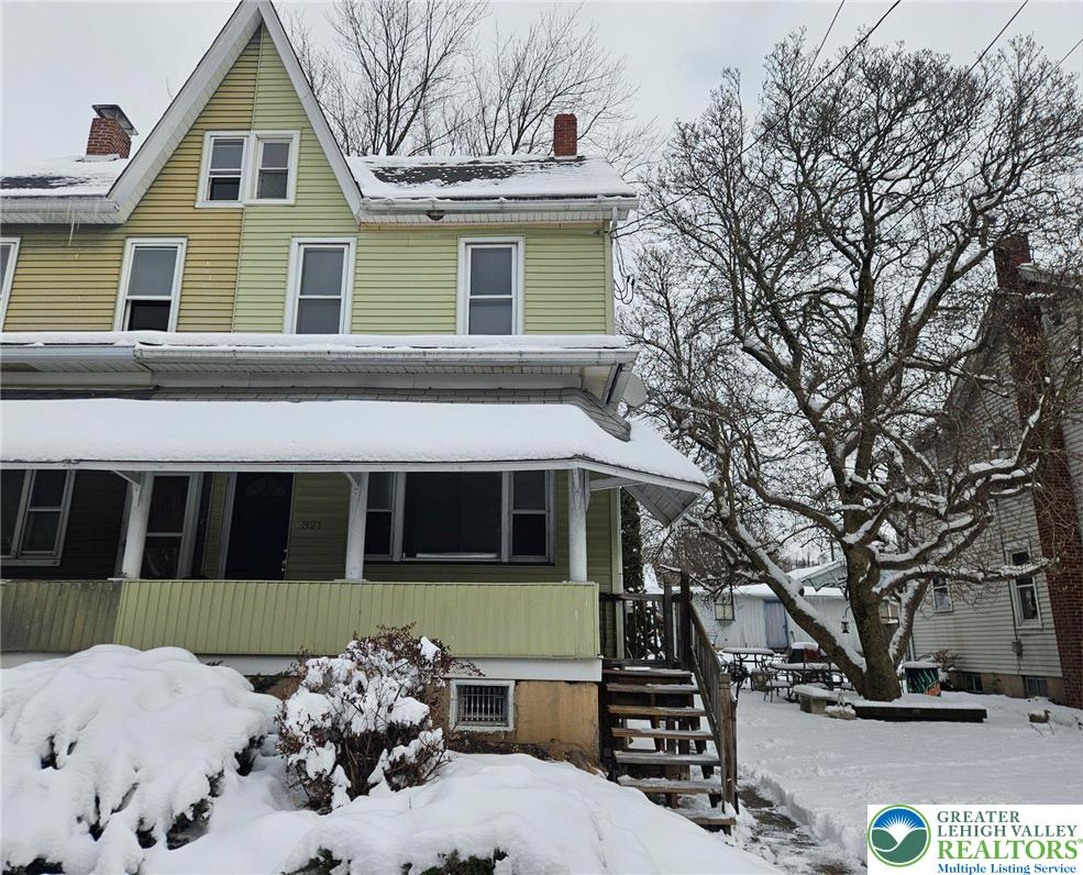 321 Washington Street Walnutport, PA 18088 - Photo 1 of 14 a front view of a house with a yard