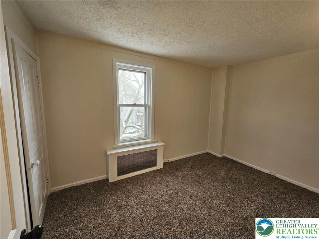 321 Washington Street Walnutport, PA 18088 - Photo 11 of 14 an empty room with windows