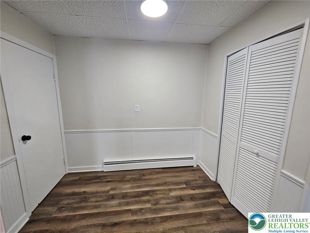 321 Washington Street Walnutport, PA 18088 - Photo 6 of 14 a view of a room with wooden floor and white walls