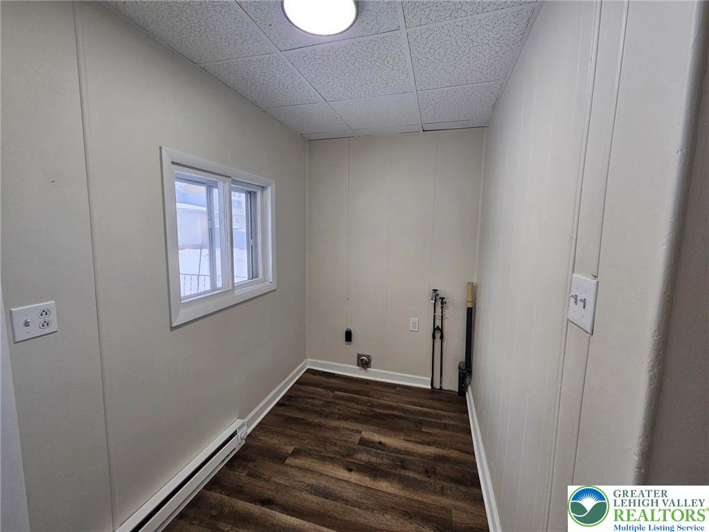 321 Washington Street Walnutport, PA 18088 - Photo 7 of 14 a view of a livingroom with wooden floor and window