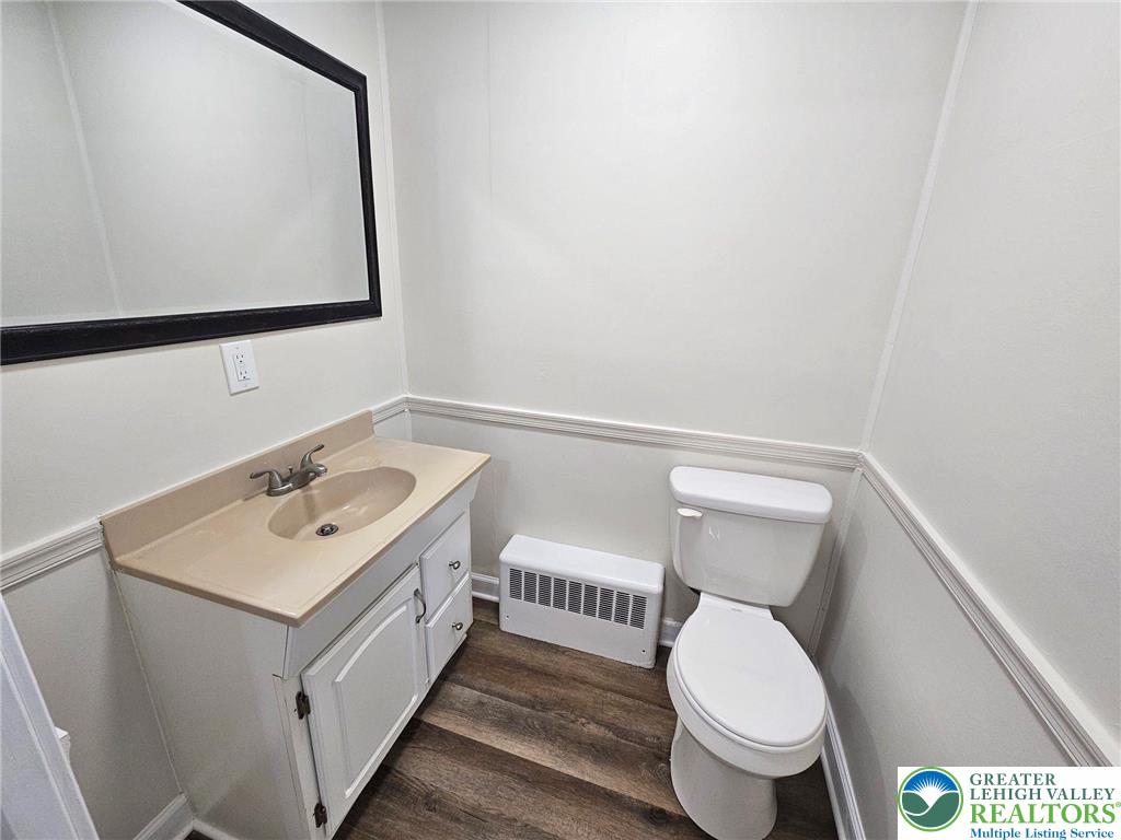 321 Washington Street Walnutport, PA 18088 - Photo 8 of 14 a bathroom with a sink toilet and mirror