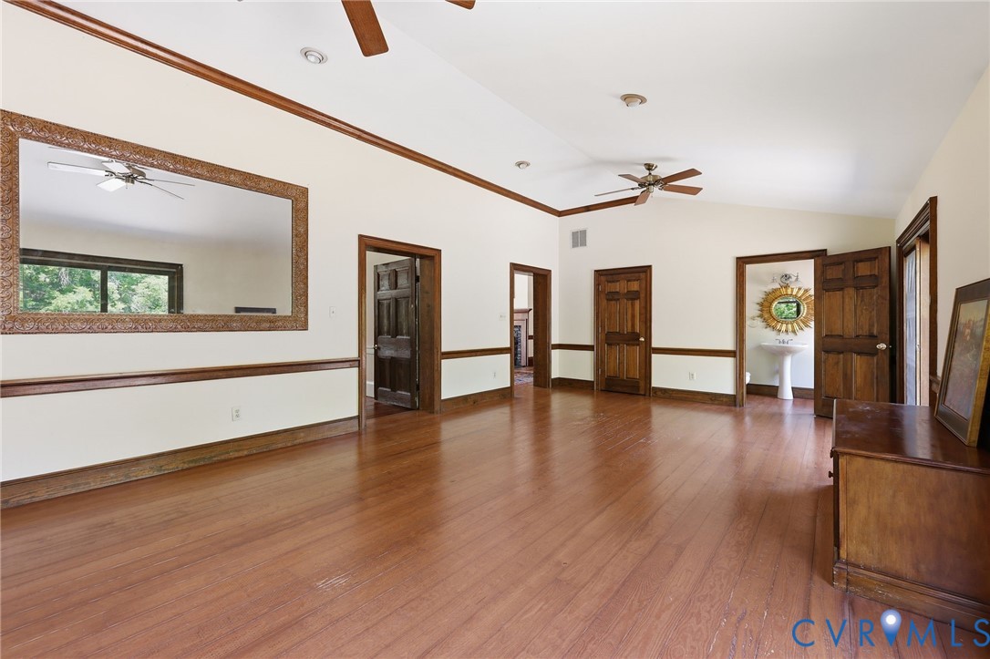 3355 Duke Road Powhatan, VA 23139 - Photo 22 of 67 a view of a livingroom with wooden floor and furniture