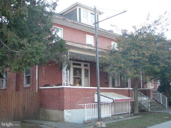 a front view of a house with balcony
