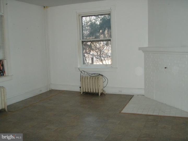 1406 Schuylkill Avenue Reading, PA 19601 - Photo 3 of 8 an empty room with windows