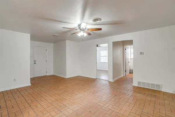 a kitchen with a sink stove and refrigerator