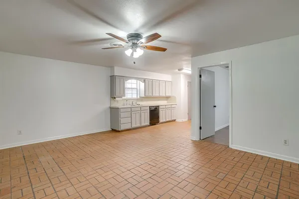 a view of a kitchen with a sink and a kitchen