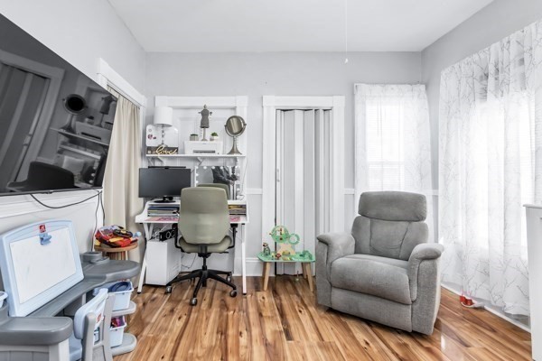 11 Cambridge Street Lawrence, MA 01843 - Photo 9 of 40 a living room with furniture and a window