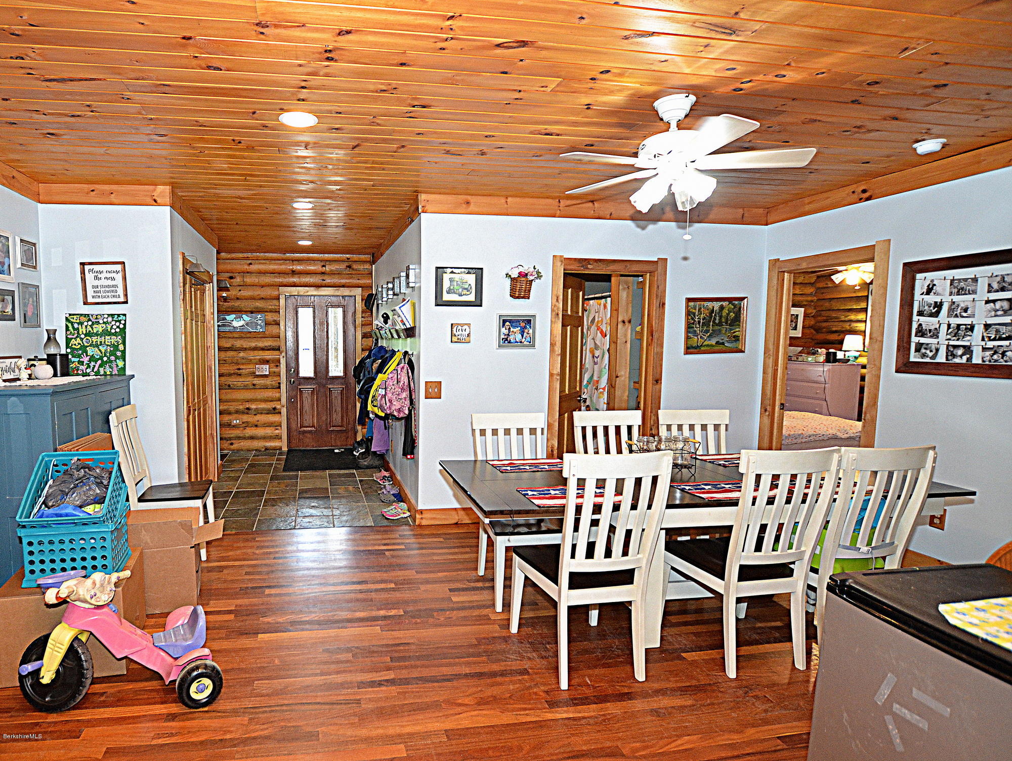 68 Cross Place Road Washington, MA 01223 - Photo 16 of 38 a view of a dining room with furniture wooden floor and chandelier