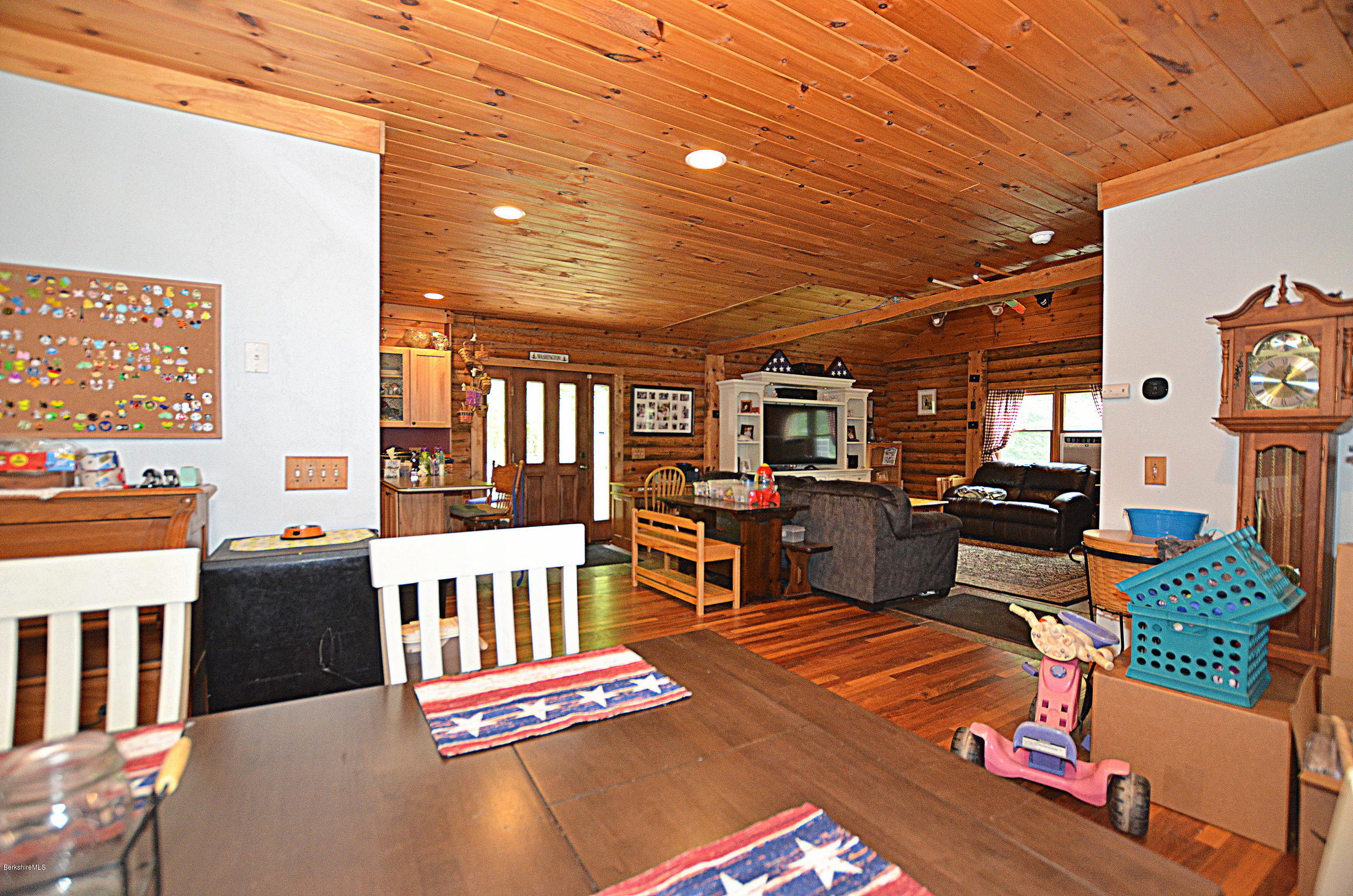 68 Cross Place Road Washington, MA 01223 - Photo 17 of 38 a living room with furniture a flat screen tv and next to a window