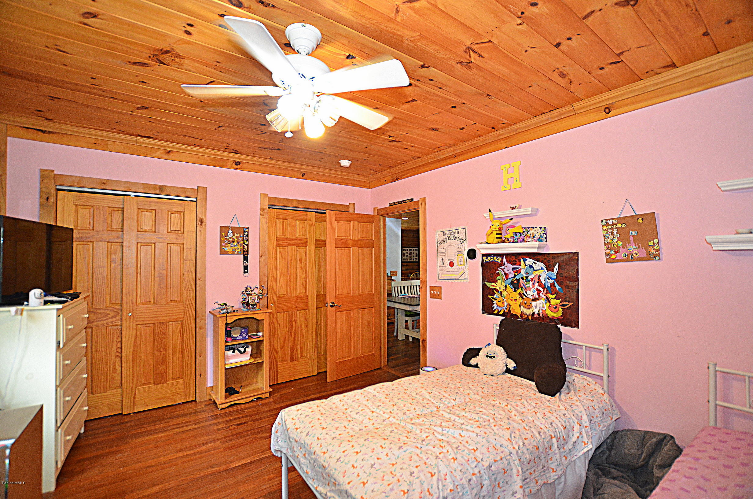 68 Cross Place Road Washington, MA 01223 - Photo 19 of 38 a bedroom with a bed dresser and a walk in closet