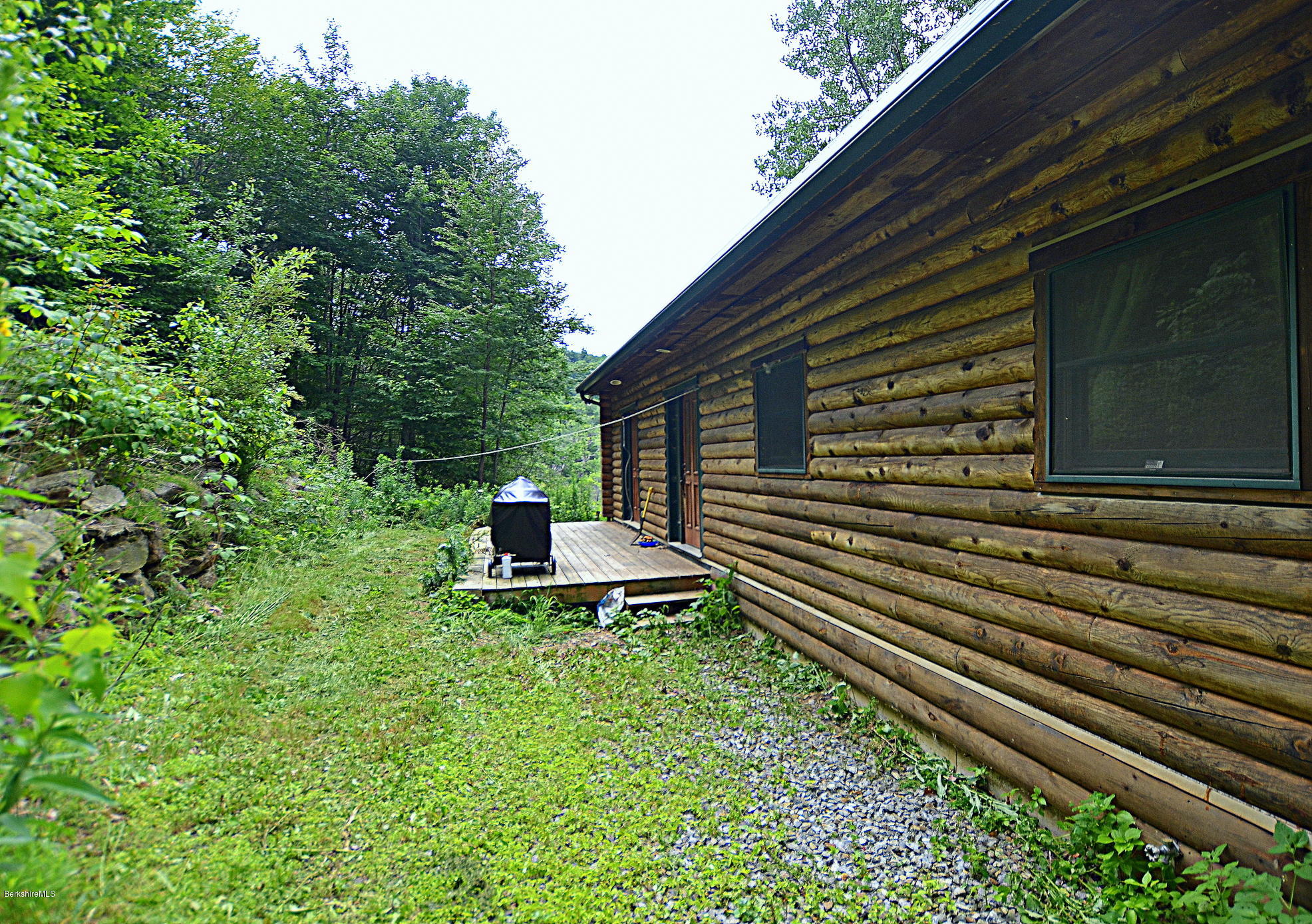 68 Cross Place Road Washington, MA 01223 - Photo 22 of 38 a view of a backyard with sitting area