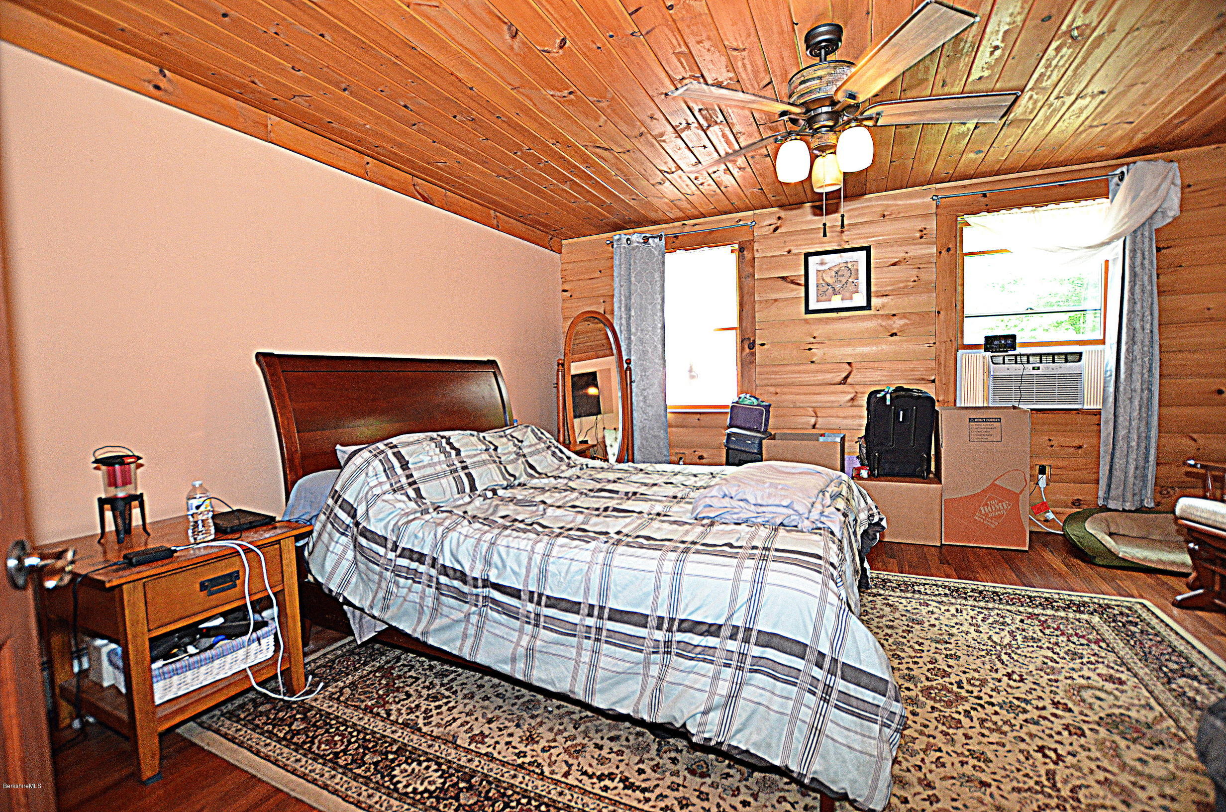 68 Cross Place Road Washington, MA 01223 - Photo 27 of 38 a bedroom with bed and wooden floor