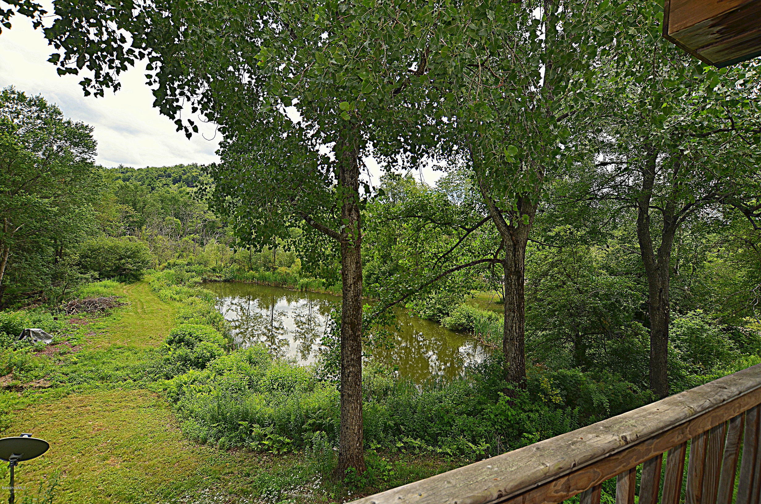 68 Cross Place Road Washington, MA 01223 - Photo 7 of 38 a backyard of a house with lots of green space
