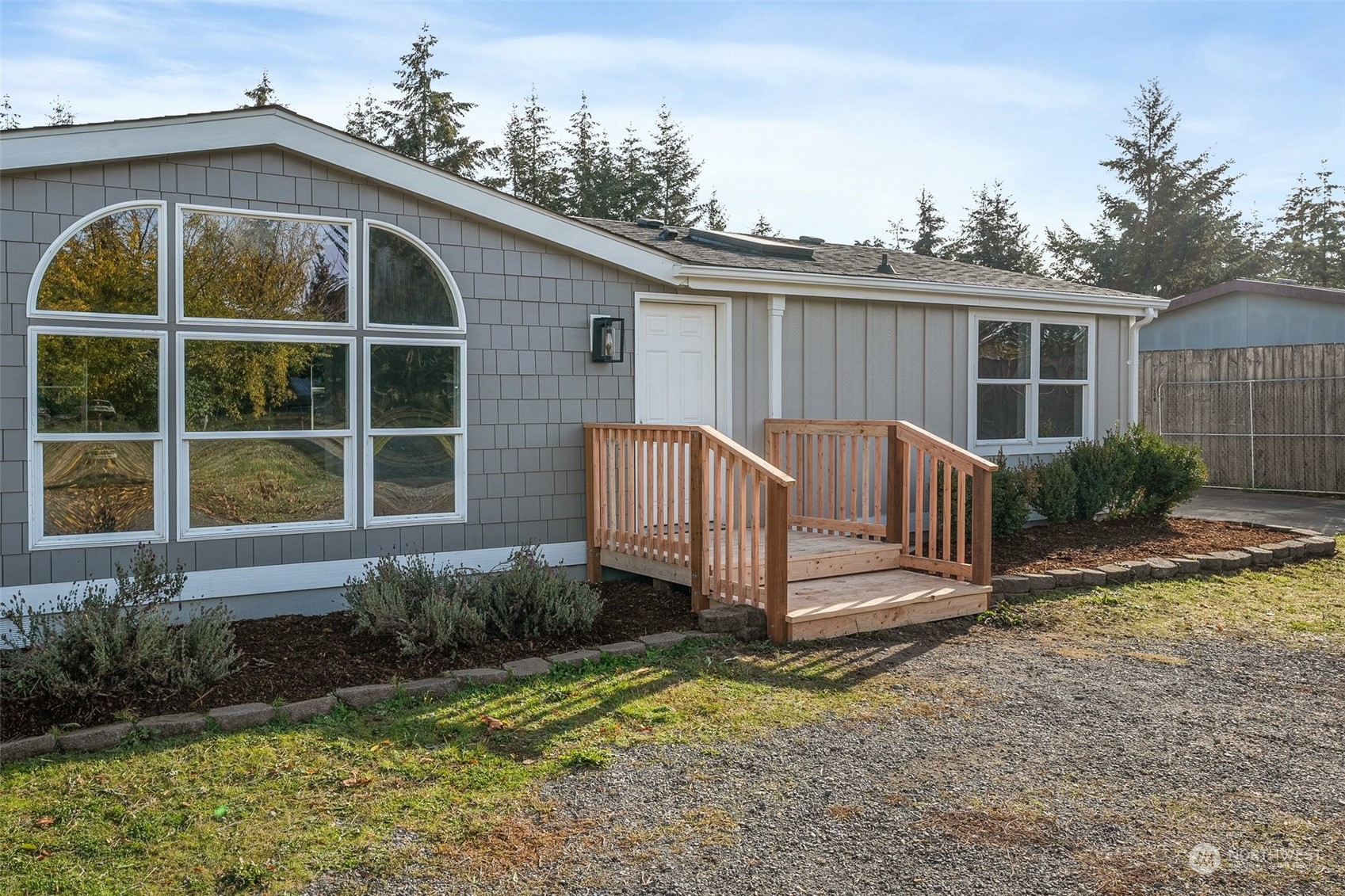 18740 Ivan Street Southwest Rochester, WA 98579 - Photo 26 of 39 a view of a house with backyard and garden