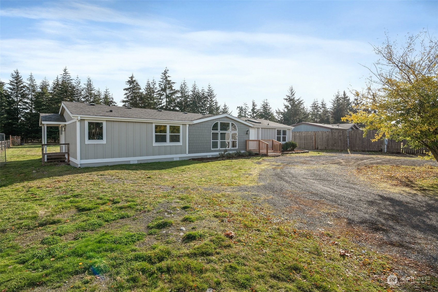 18740 Ivan Street Southwest Rochester, WA 98579 - Photo 27 of 39 a view of a house with a yard