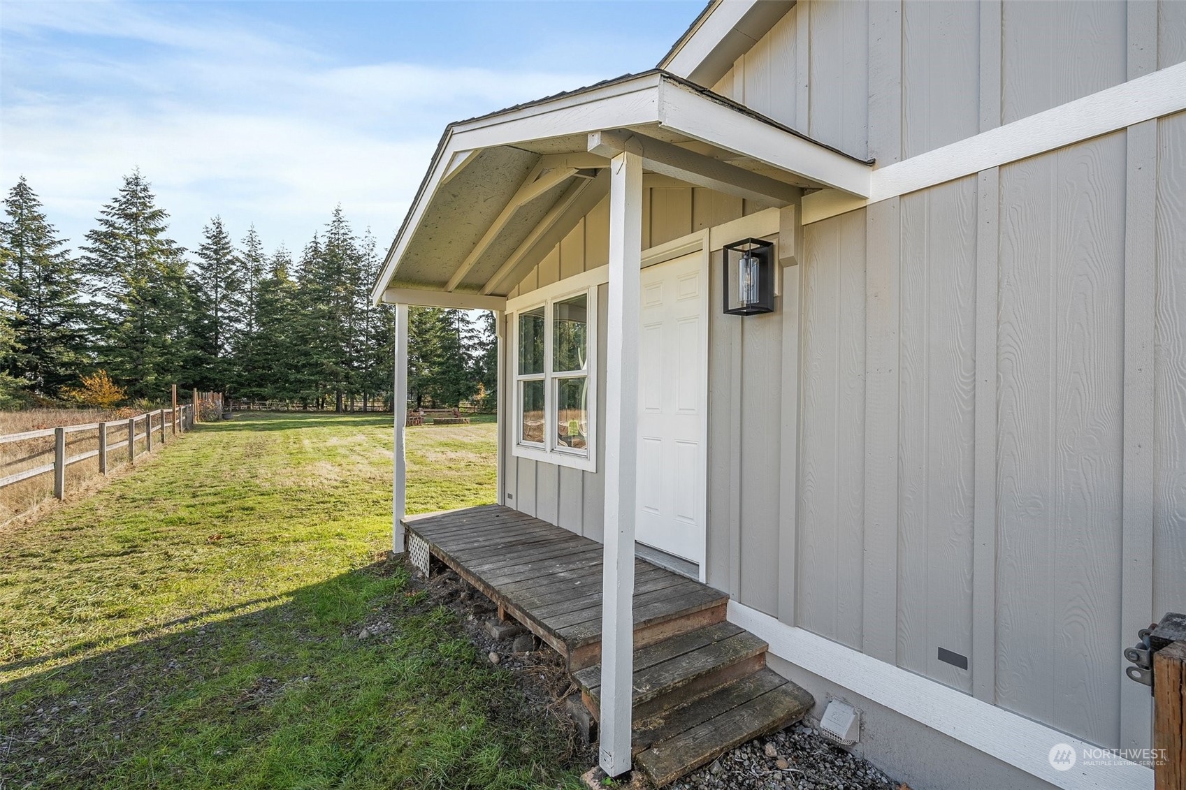 18740 Ivan Street Southwest Rochester, WA 98579 - Photo 28 of 39 a view of a house with backyard and swimming pool