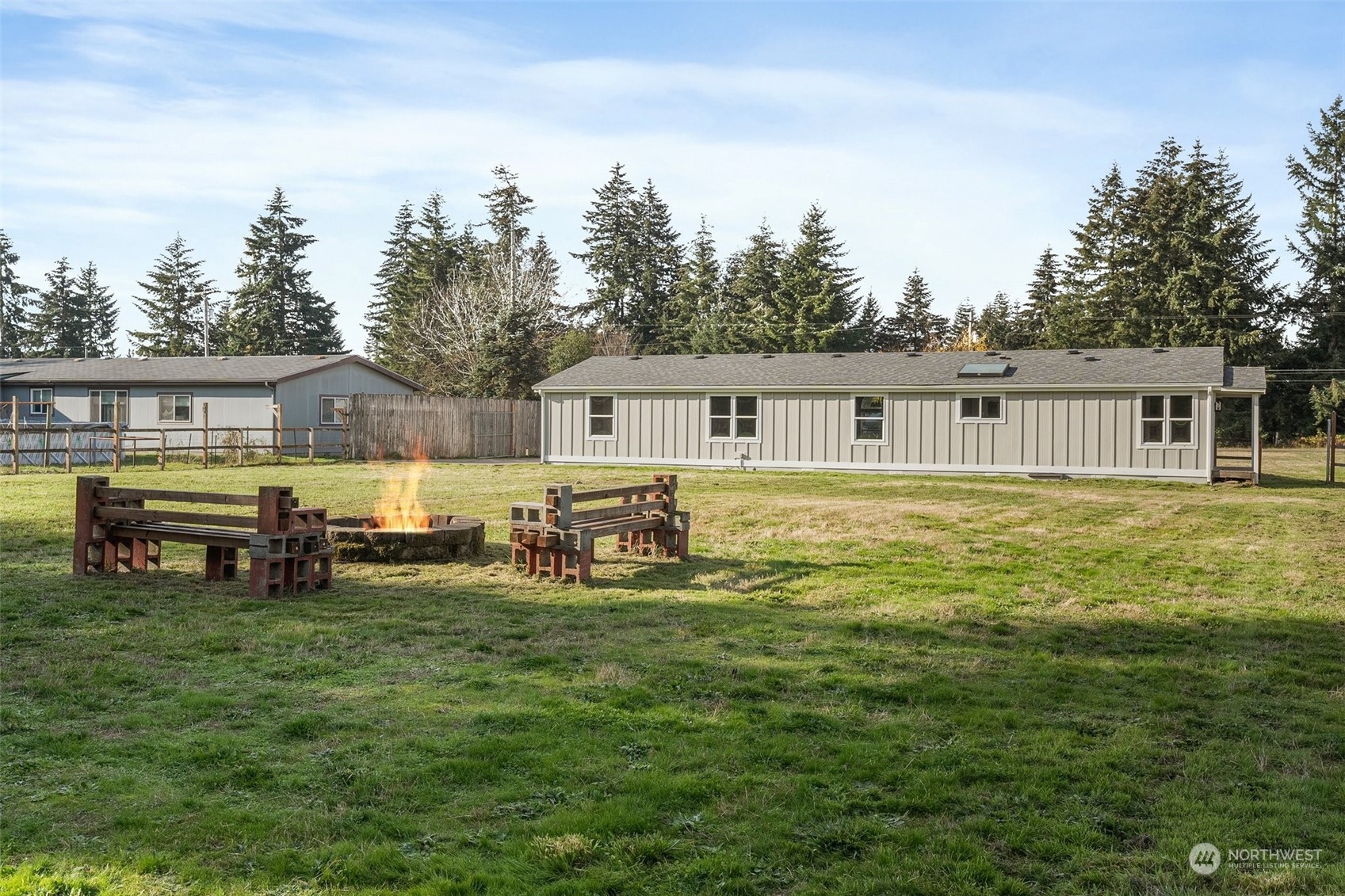 18740 Ivan Street Southwest Rochester, WA 98579 - Photo 30 of 39 a view of a house with swimming pool yard and outdoor seating