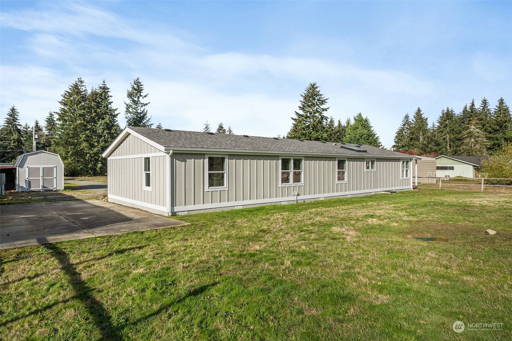18740 Ivan Street Southwest Rochester, WA 98579 - Photo 32 of 39 a view of a house with a backyard