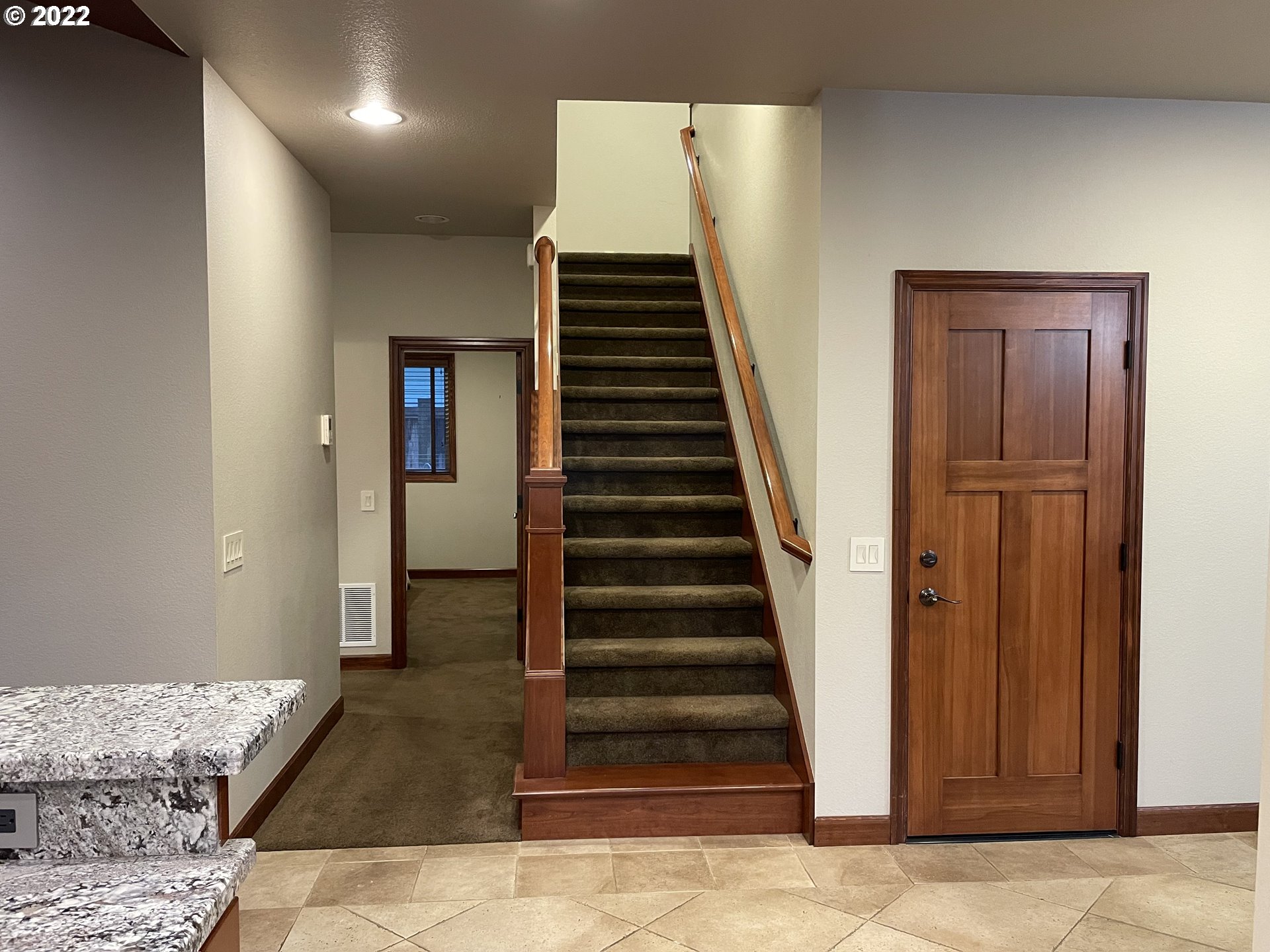 3247 Lake Crest Drive Eugene, OR 97408 - Photo 12 of 31 a view of entryway with stairs and wooden floor