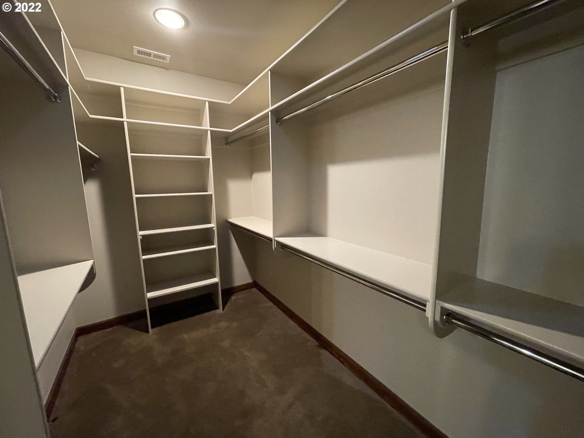 3247 Lake Crest Drive Eugene, OR 97408 - Photo 21 of 31 a view of an empty room with empty shelves