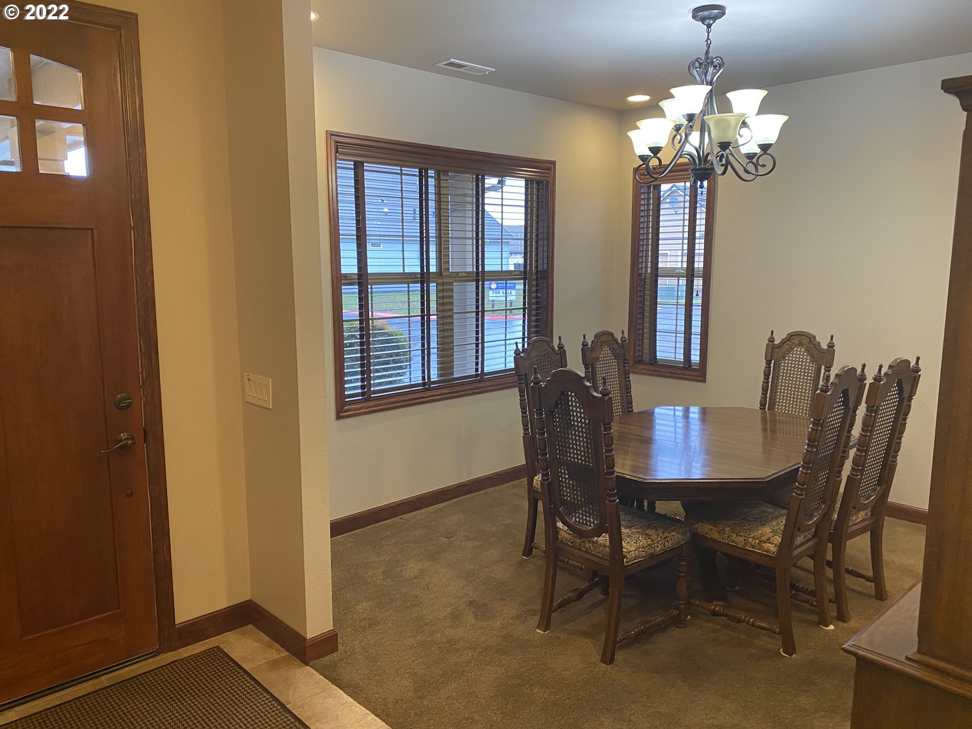 3247 Lake Crest Drive Eugene, OR 97408 - Photo 5 of 31 a view of a dining room with furniture and window