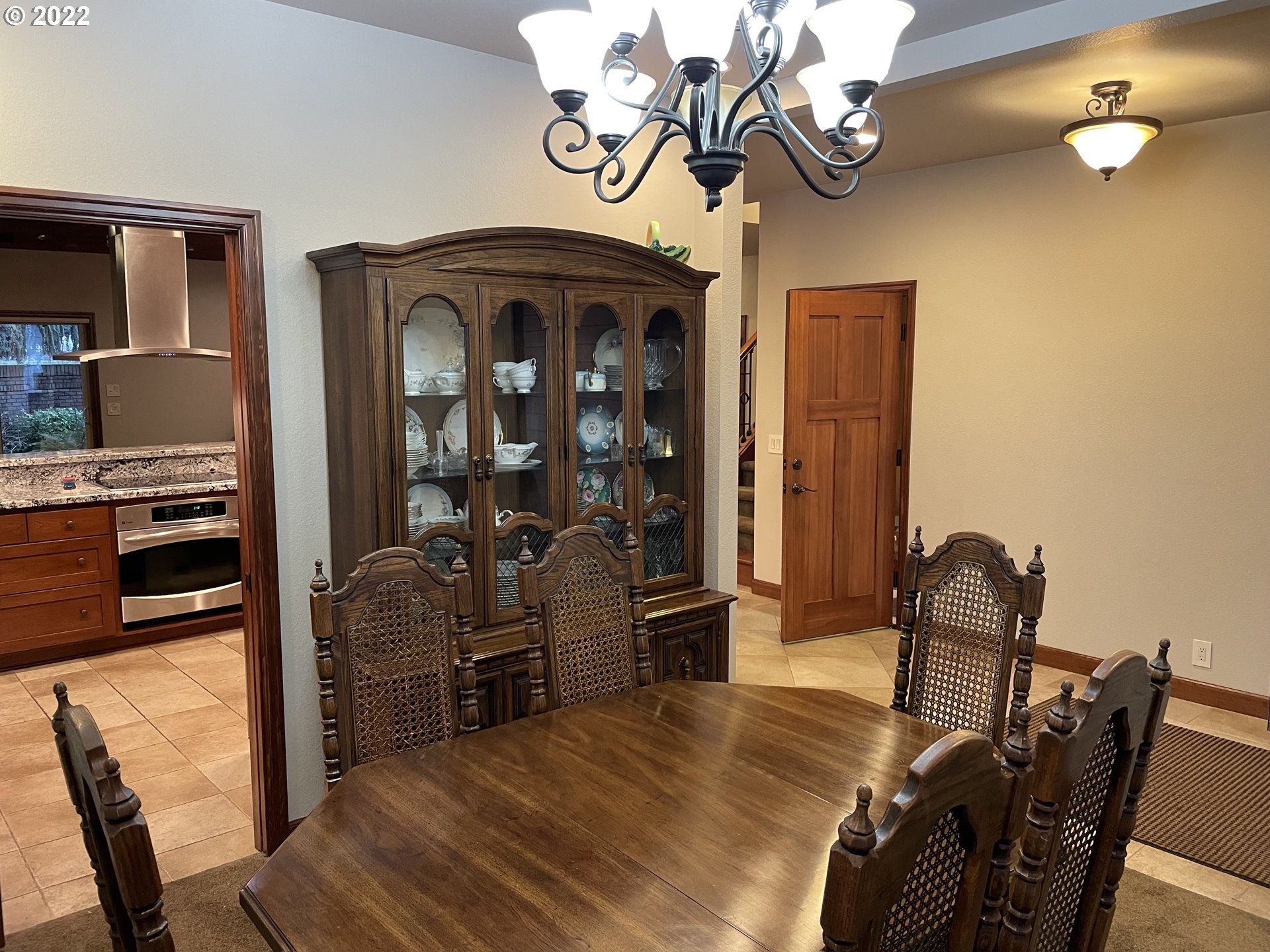 3247 Lake Crest Drive Eugene, OR 97408 - Photo 6 of 31 a view of a dining room with furniture and chandelier