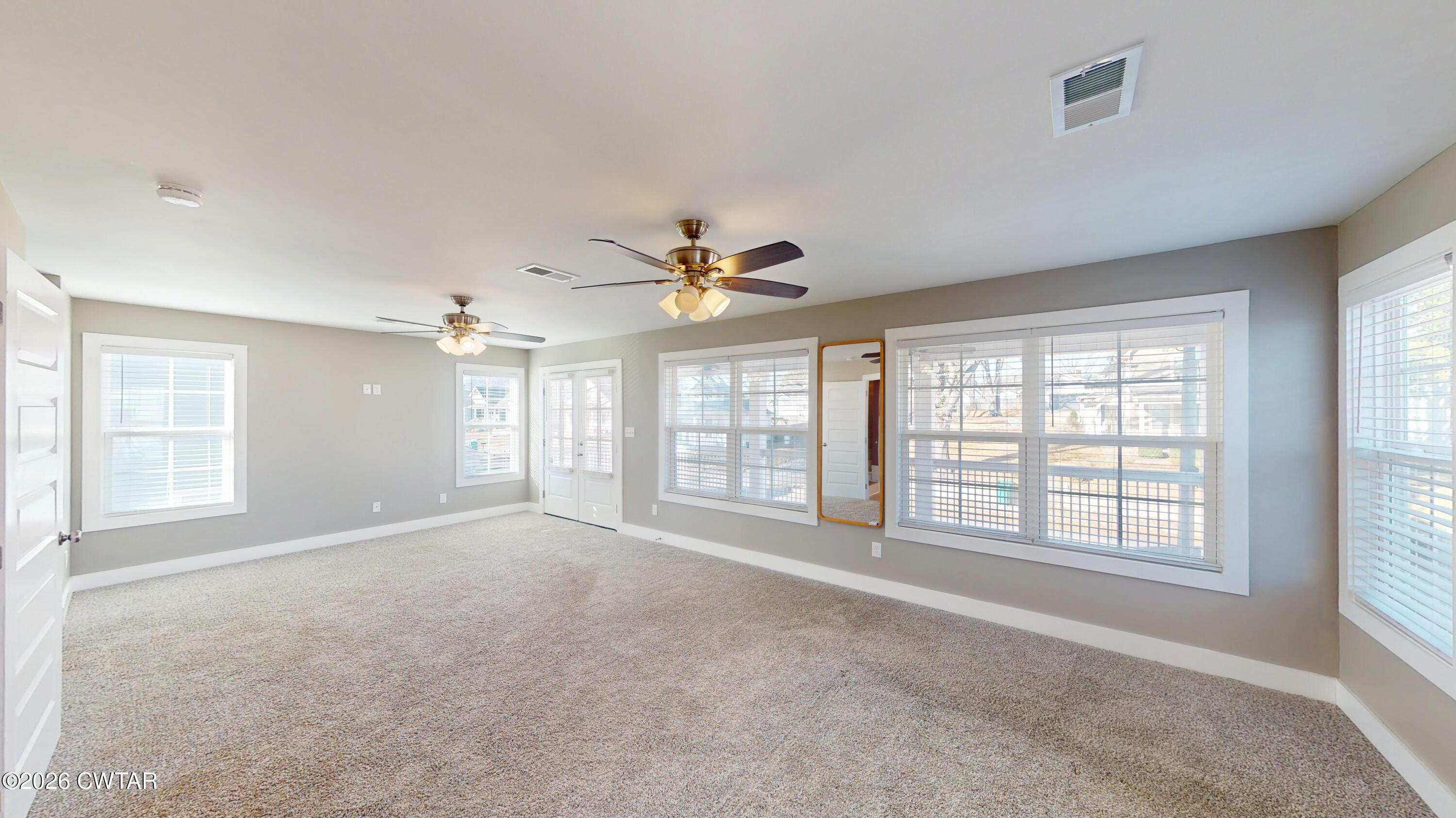 226 Morgan Street Jackson, TN 38301 - Photo 20 of 51 a view of an empty room with a window