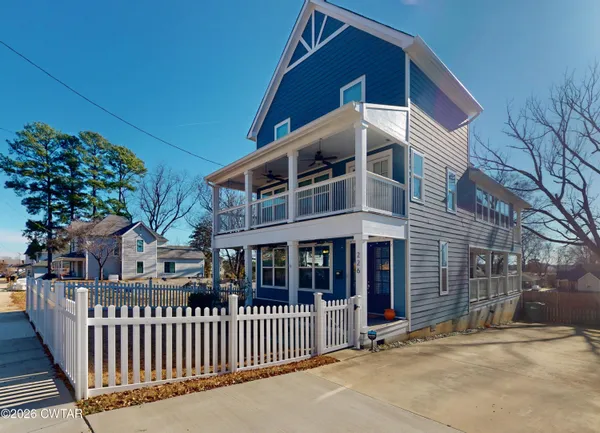 a view of a house with a balcony