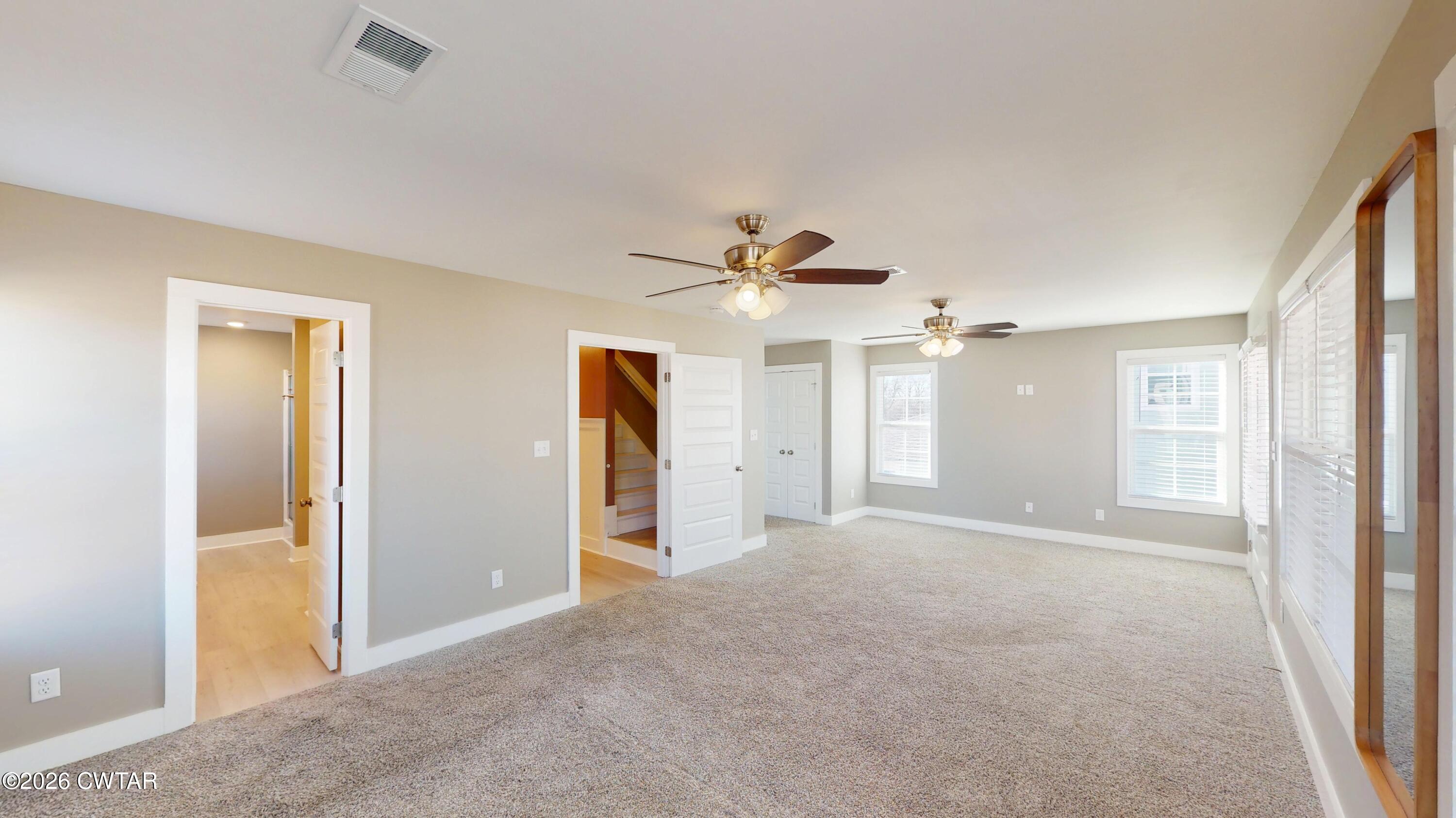 226 Morgan Street Jackson, TN 38301 - Photo 21 of 51 a view of a livingroom with a ceiling fan and window