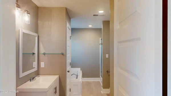 a view of walk in closet with window