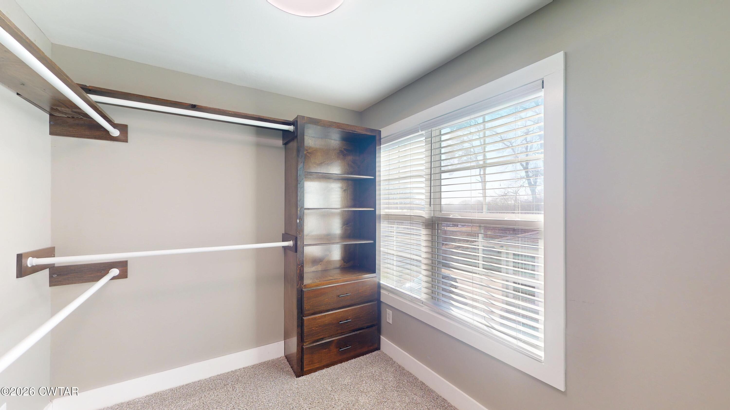 226 Morgan Street Jackson, TN 38301 - Photo 26 of 51 a view of walk in closet with window