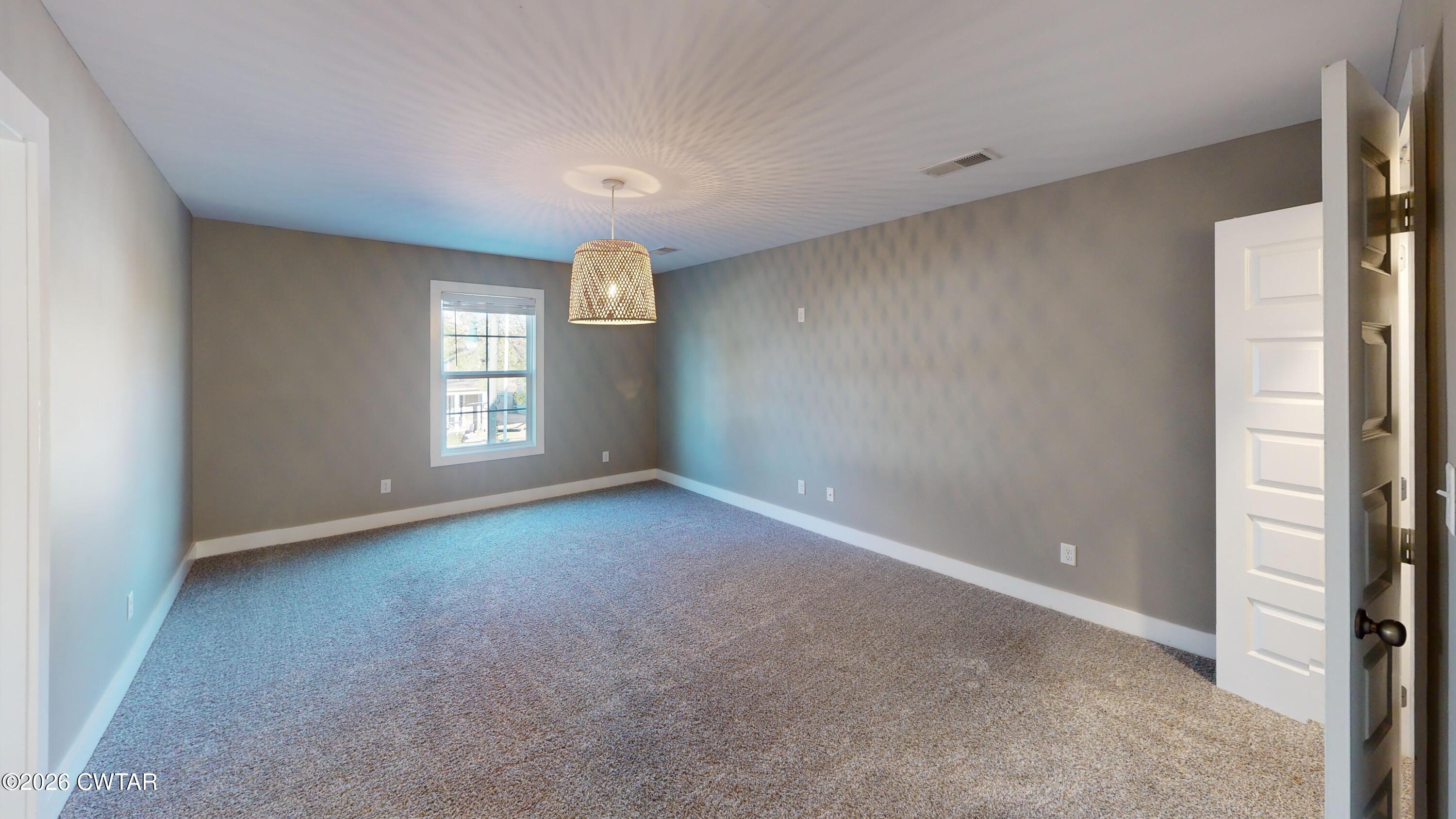 226 Morgan Street Jackson, TN 38301 - Photo 37 of 51 a view of an empty room with a window