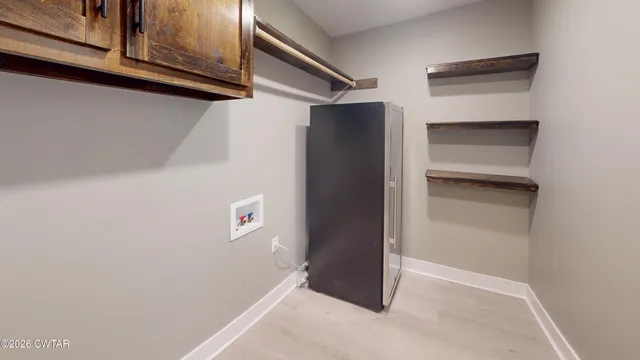 a view of a balcony with furniture