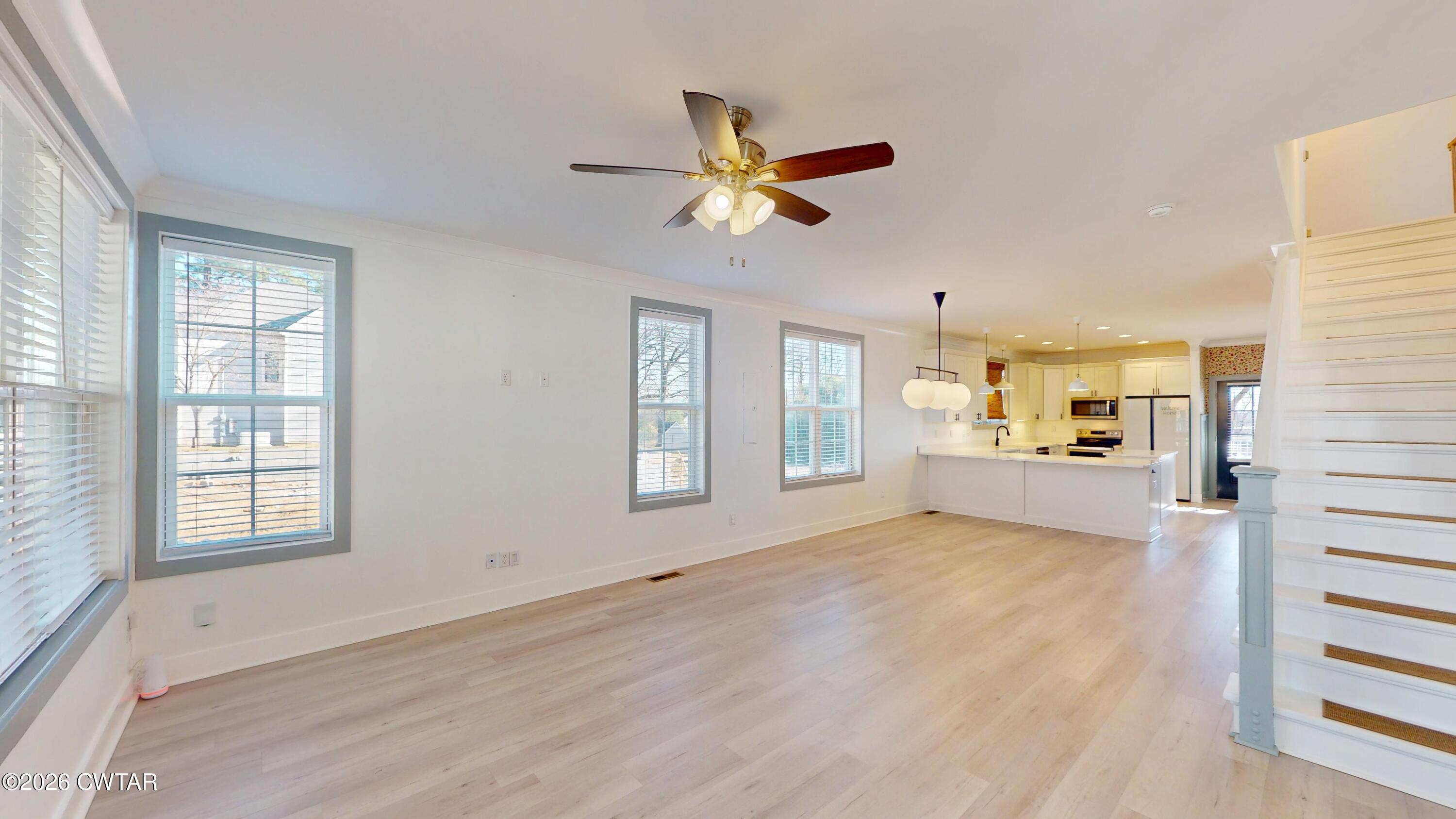 226 Morgan Street Jackson, TN 38301 - Photo 5 of 51 a view of an empty room with a window