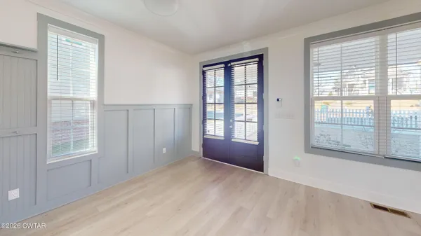an empty room with windows