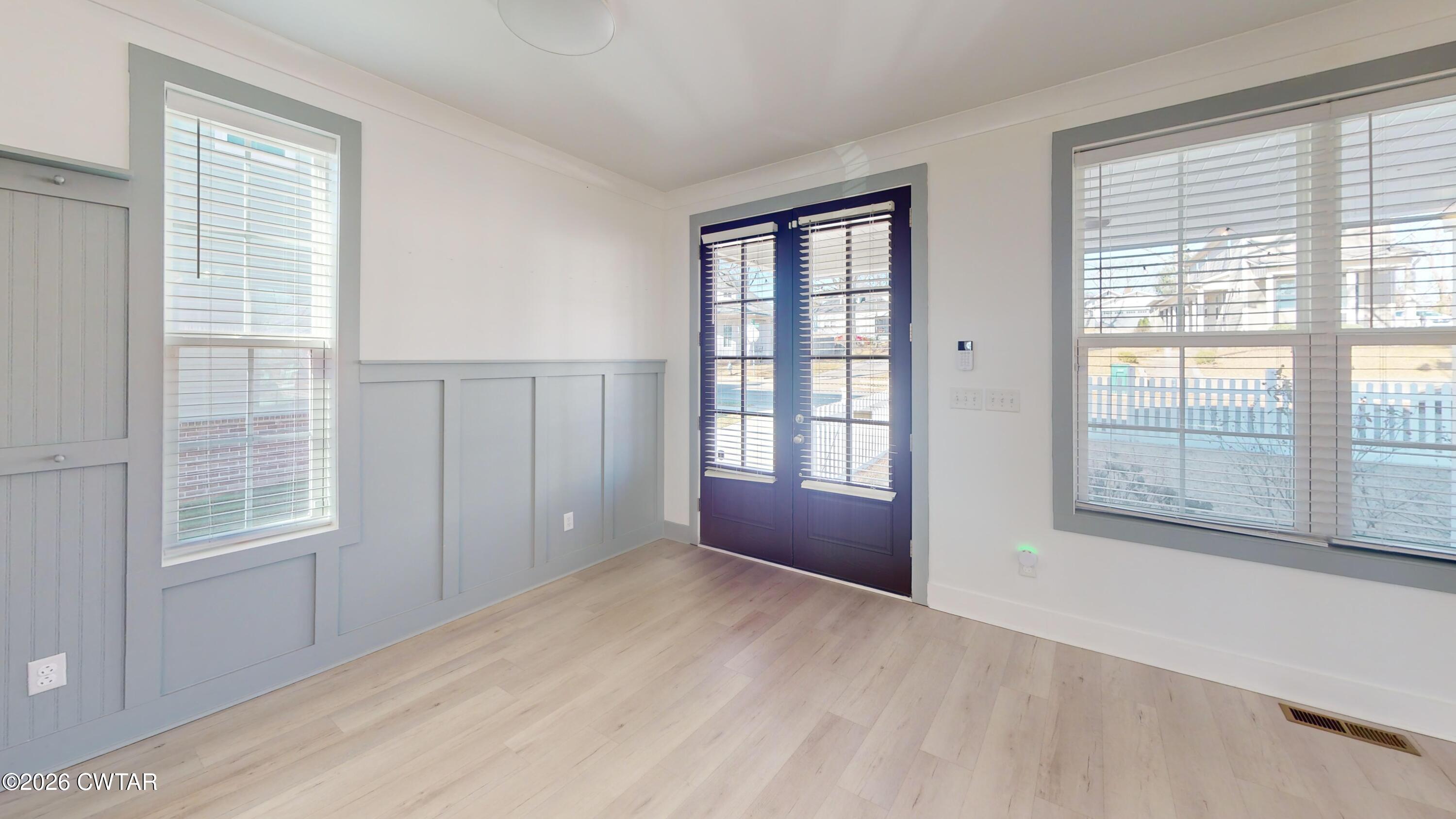 226 Morgan Street Jackson, TN 38301 - Photo 6 of 51 an empty room with windows