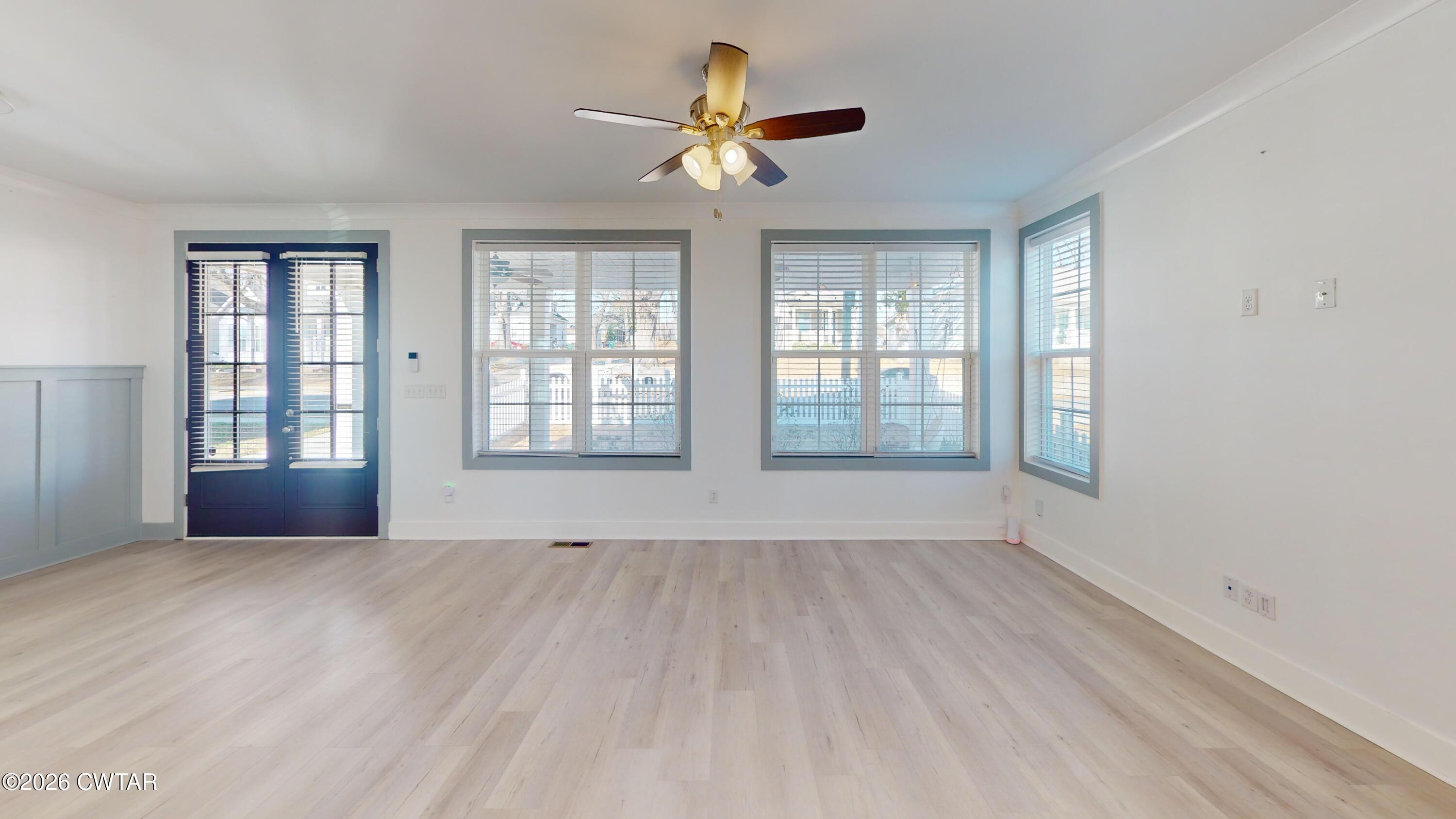 226 Morgan Street Jackson, TN 38301 - Photo 7 of 51 a view of an empty room with a window
