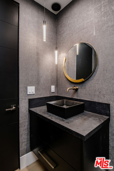 26 Baymare Road Bell Canyon, CA 91307 - Photo 14 of 39 a bathroom with a sink and mirror