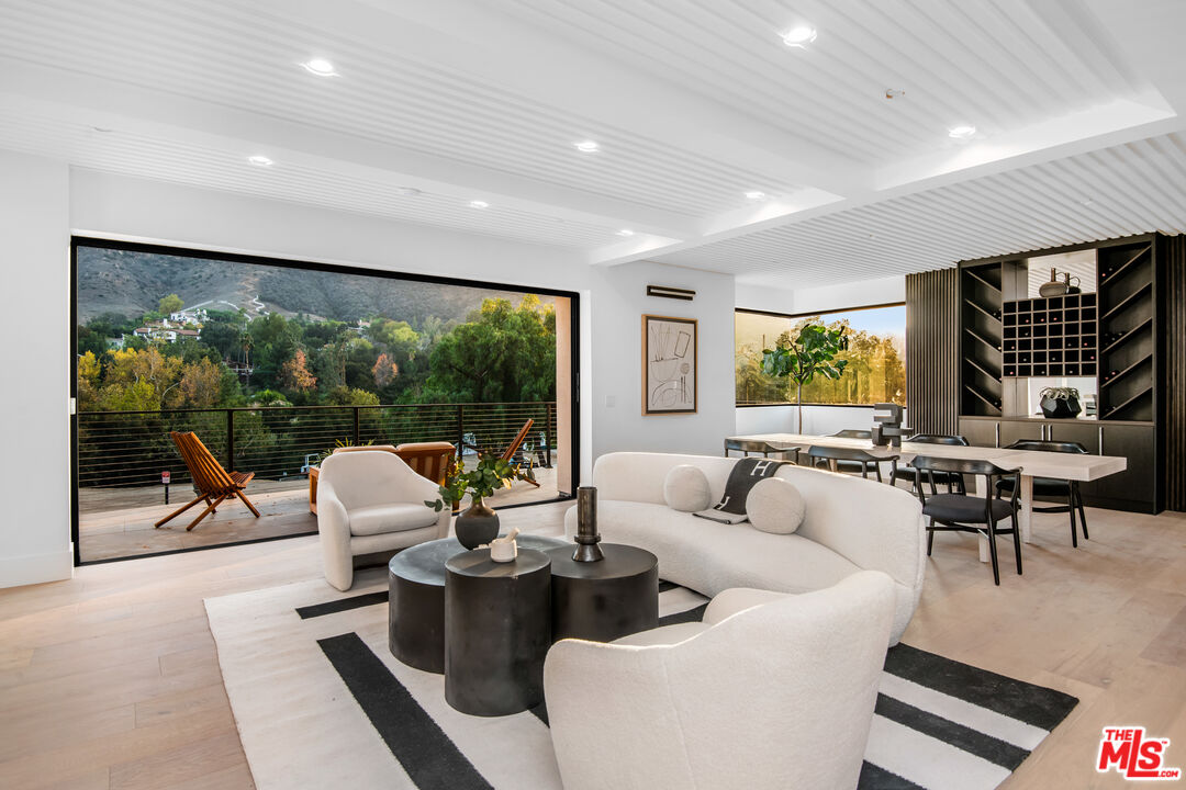 26 Baymare Road Bell Canyon, CA 91307 - Photo 21 of 39 a living room with furniture and a large window