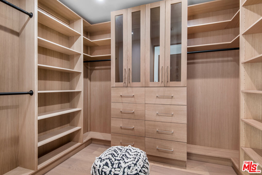 26 Baymare Road Bell Canyon, CA 91307 - Photo 26 of 39 a view of walk in closet with empty racks