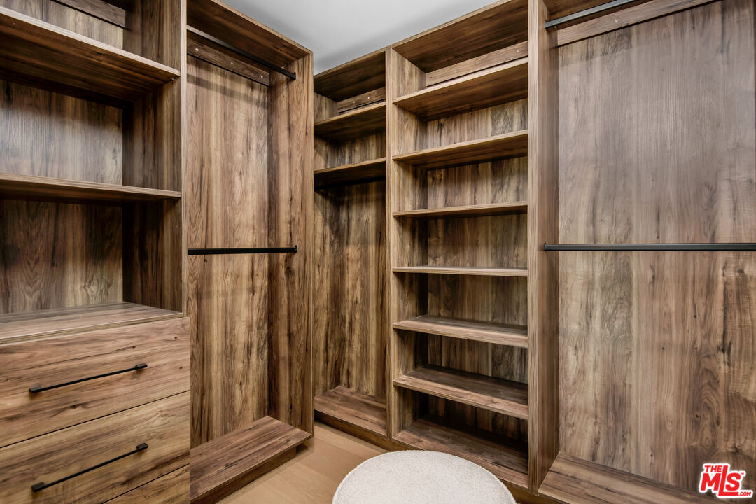 26 Baymare Road Bell Canyon, CA 91307 - Photo 27 of 39 a view of walk in closet with empty racks