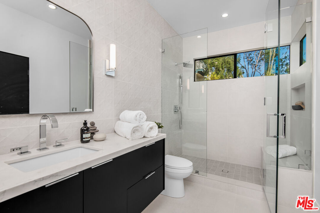 26 Baymare Road Bell Canyon, CA 91307 - Photo 34 of 39 a bathroom with a sink toilet and shower