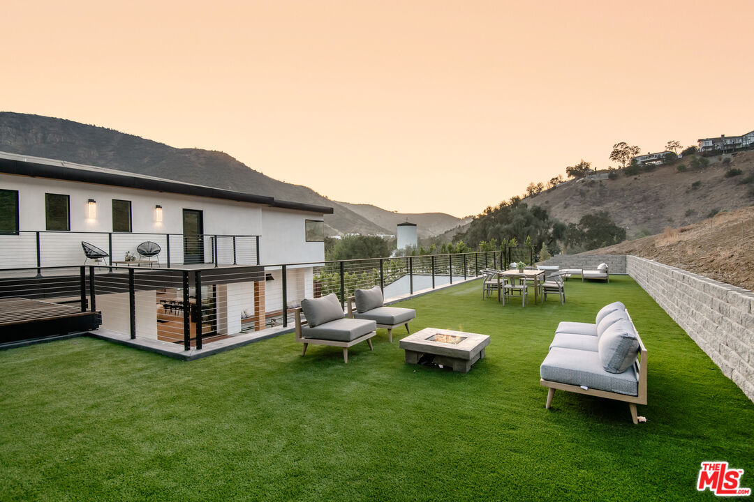 26 Baymare Road Bell Canyon, CA 91307 - Photo 39 of 39 a view of a house with pool and chairs