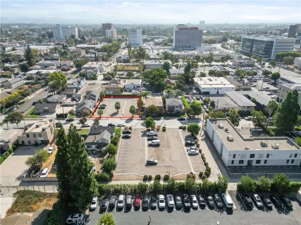 an aerial view of a city with lots of residential buildings