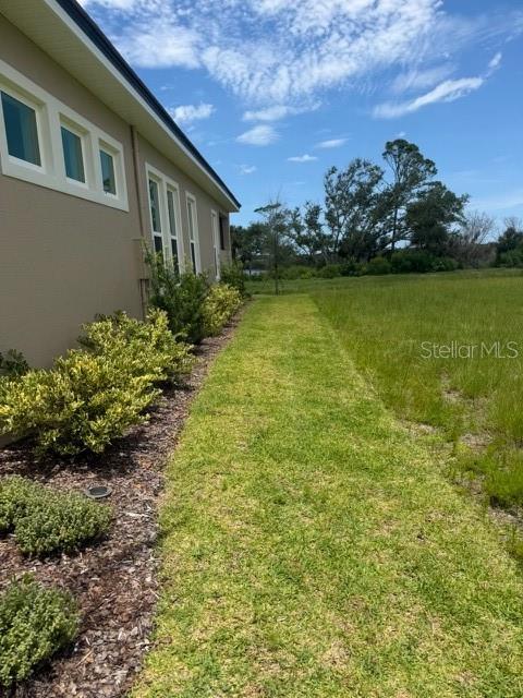 4 Coronado Road Flagler Beach, FL 32136 - Photo 12 of 30 a house with garden in front of it