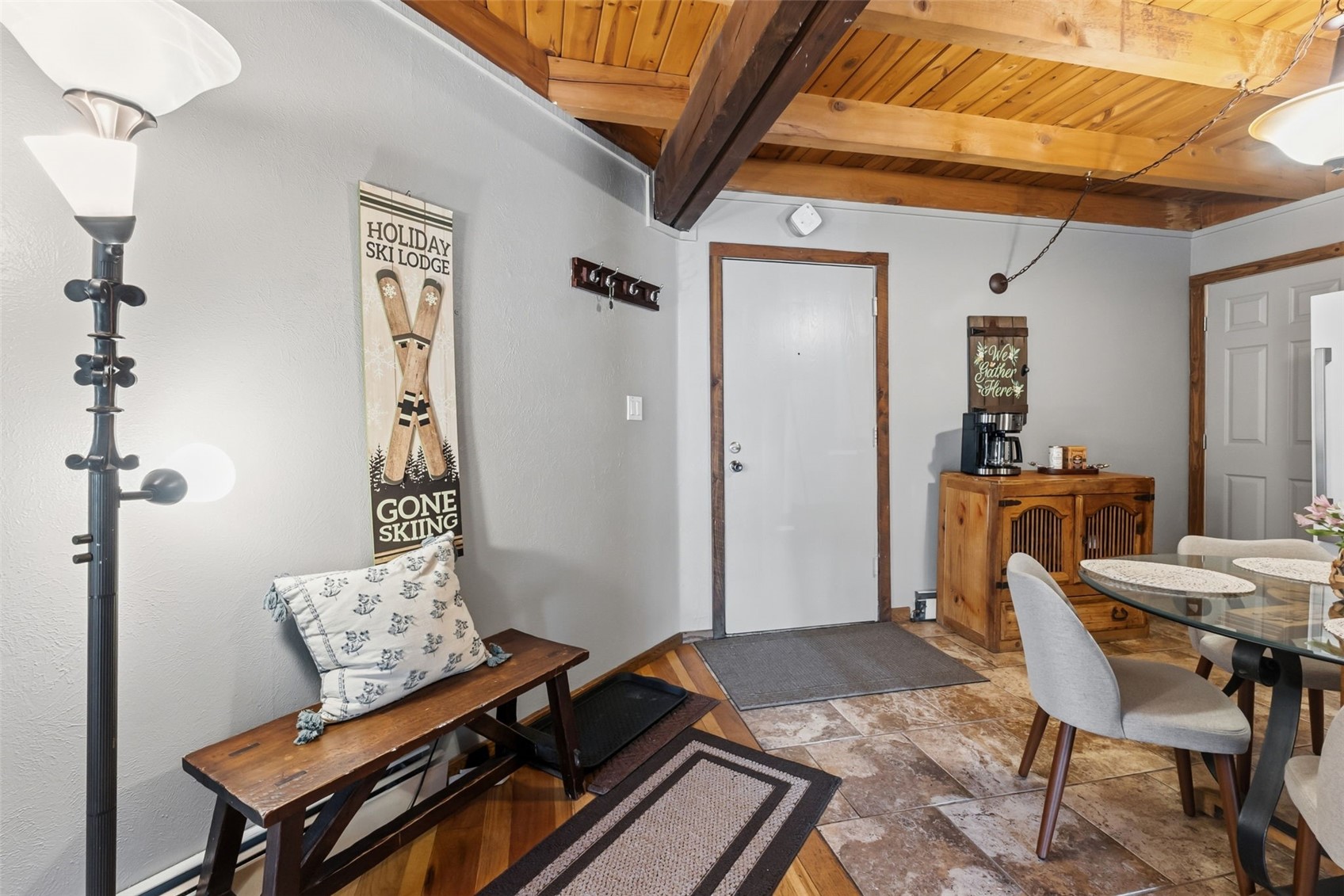 8500 Ryan Gulch Road, Unit 206 Silverthorne, CO 80498 - Photo 12 of 34 a living room with a couch