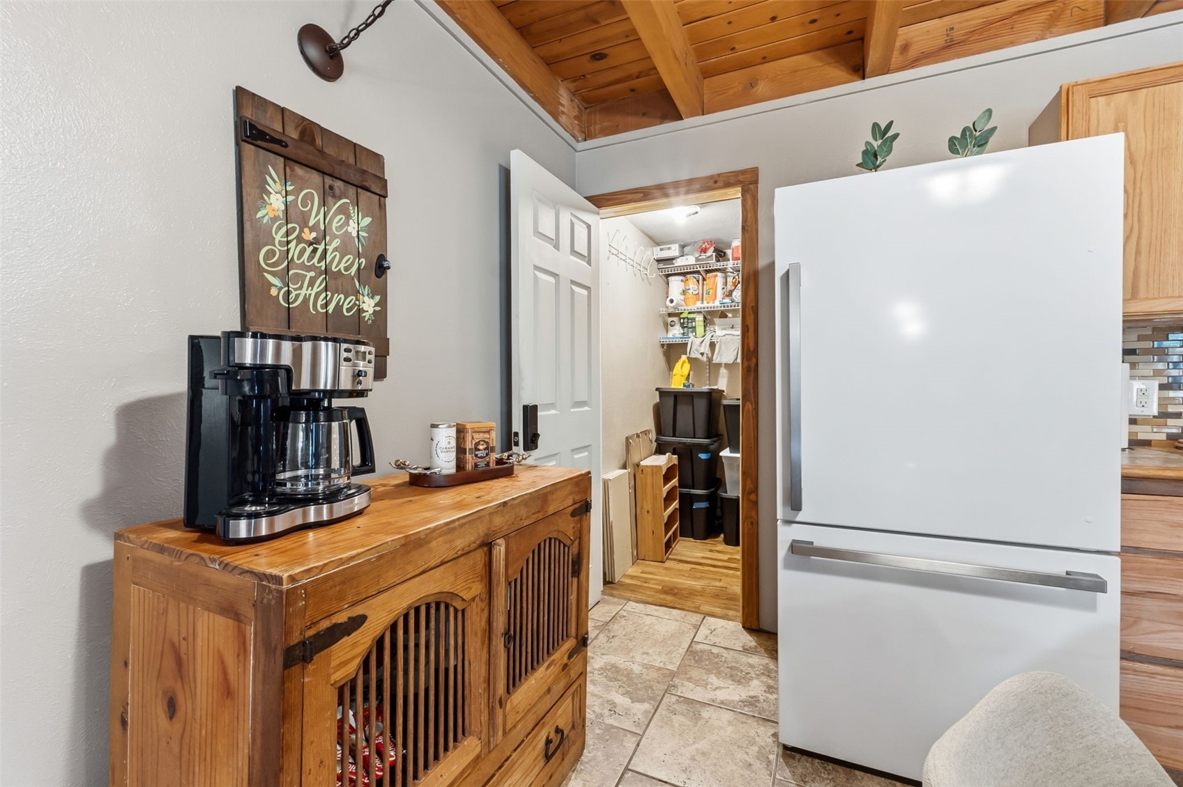 8500 Ryan Gulch Road, Unit 206 Silverthorne, CO 80498 - Photo 22 of 34 a kitchen with stainless steel appliances granite countertop a refrigerator a stove and a refrigerator