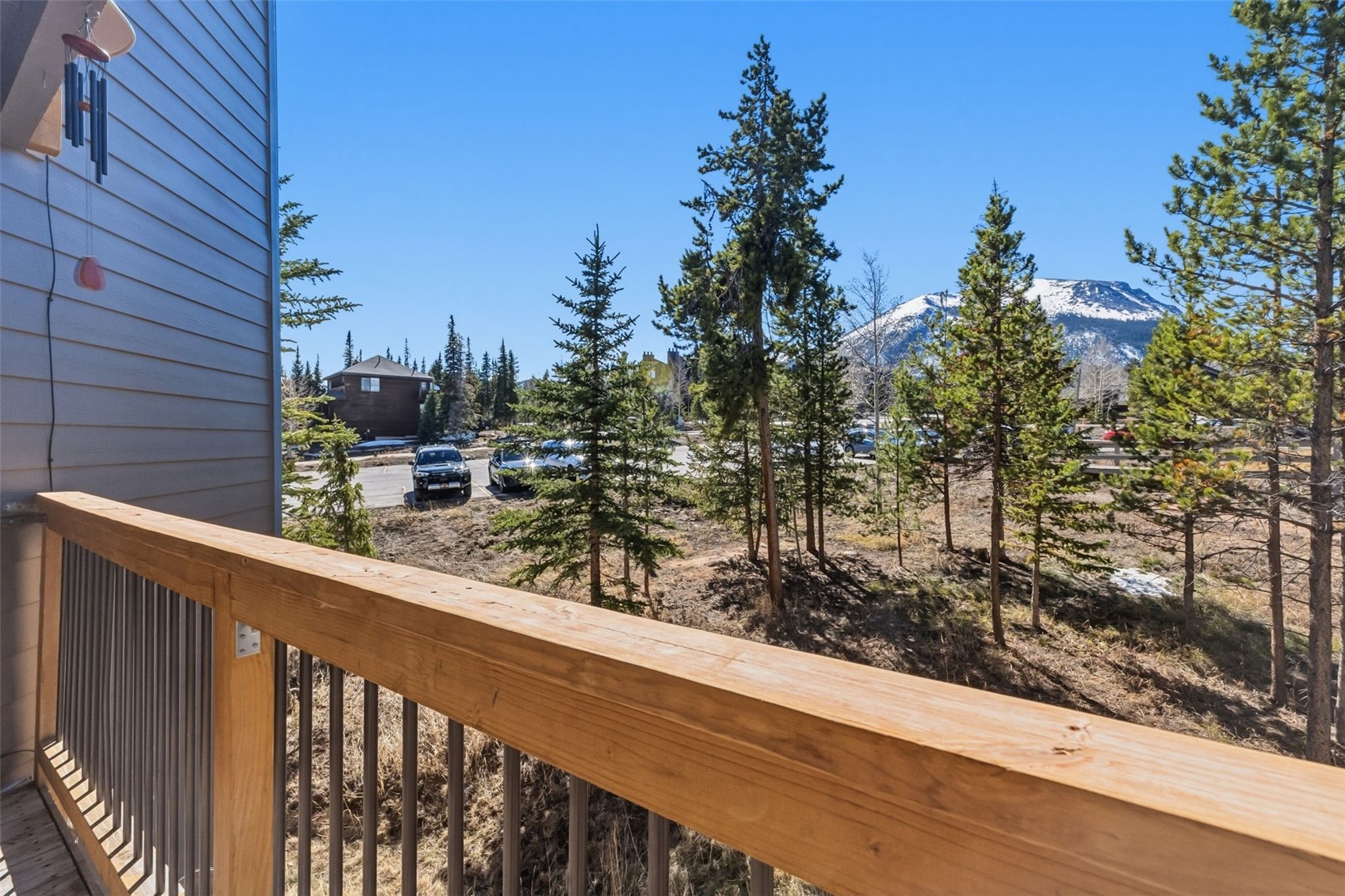 8500 Ryan Gulch Road, Unit 206 Silverthorne, CO 80498 - Photo 25 of 34 a view of a lake from a balcony